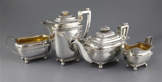 A George V four piece silver tea set by John, Hunt, gross 73 oz.
